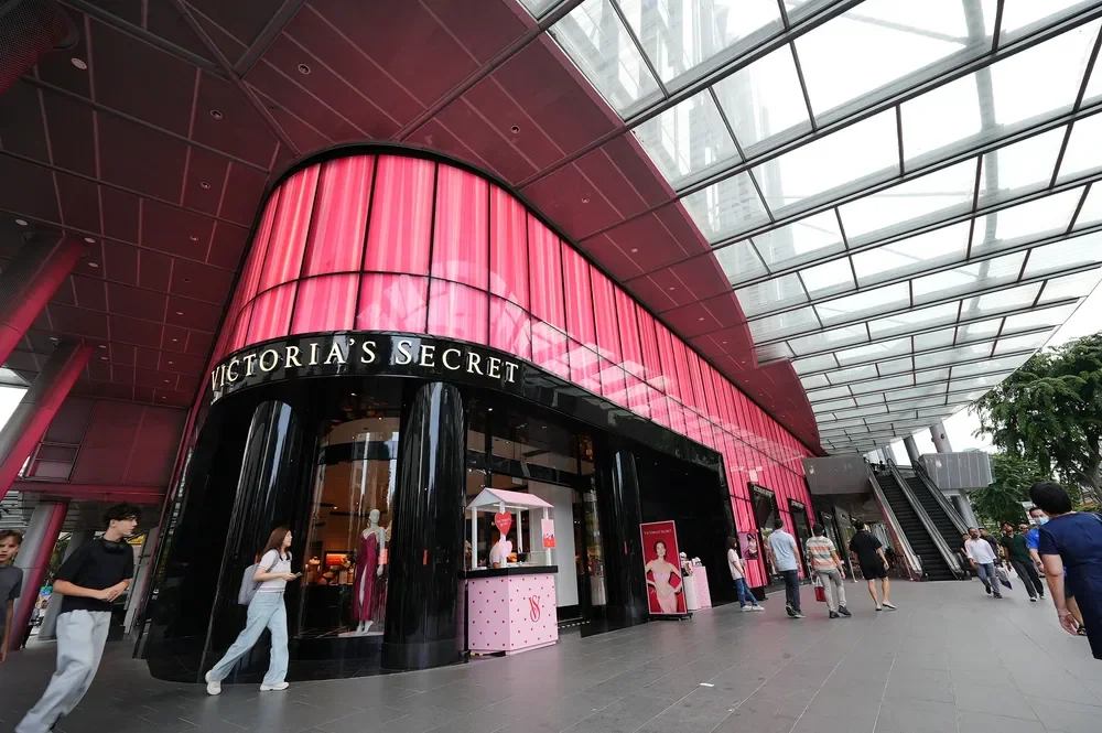 Victoria’s Secret pink storefront and in-store dessert cart